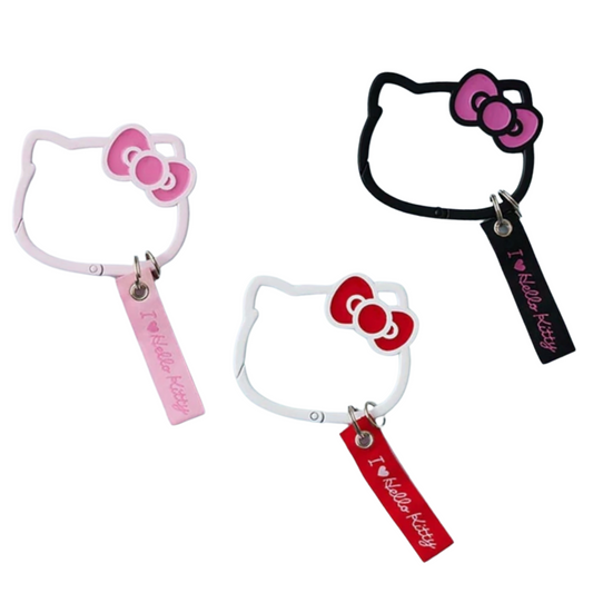 Two Hello Kitty-themed hair ties with colorful tags on a white background