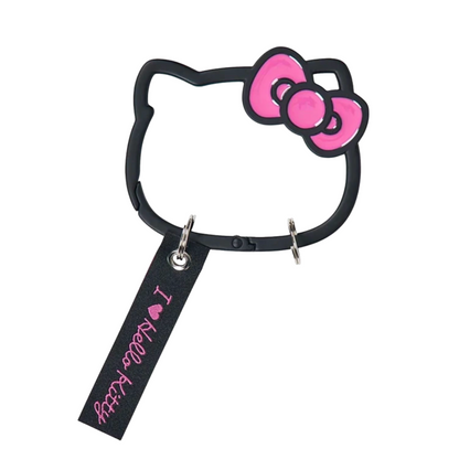 Hello Kitty headband with pink bow and 'I ❤️ Hello Kitty' tag on a white background