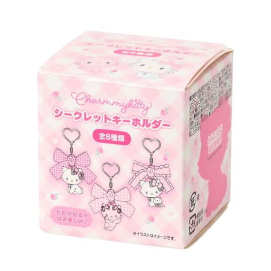 Pink packaging of Charmmy Kitty key holder set on a white background