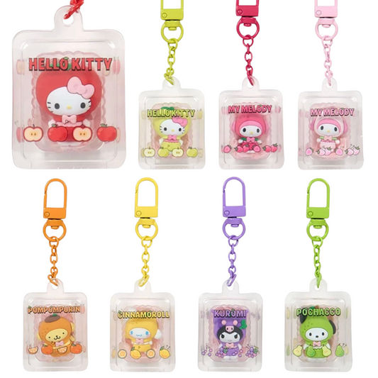 Collection of colorful keychains featuring various characters in packaging on a white background