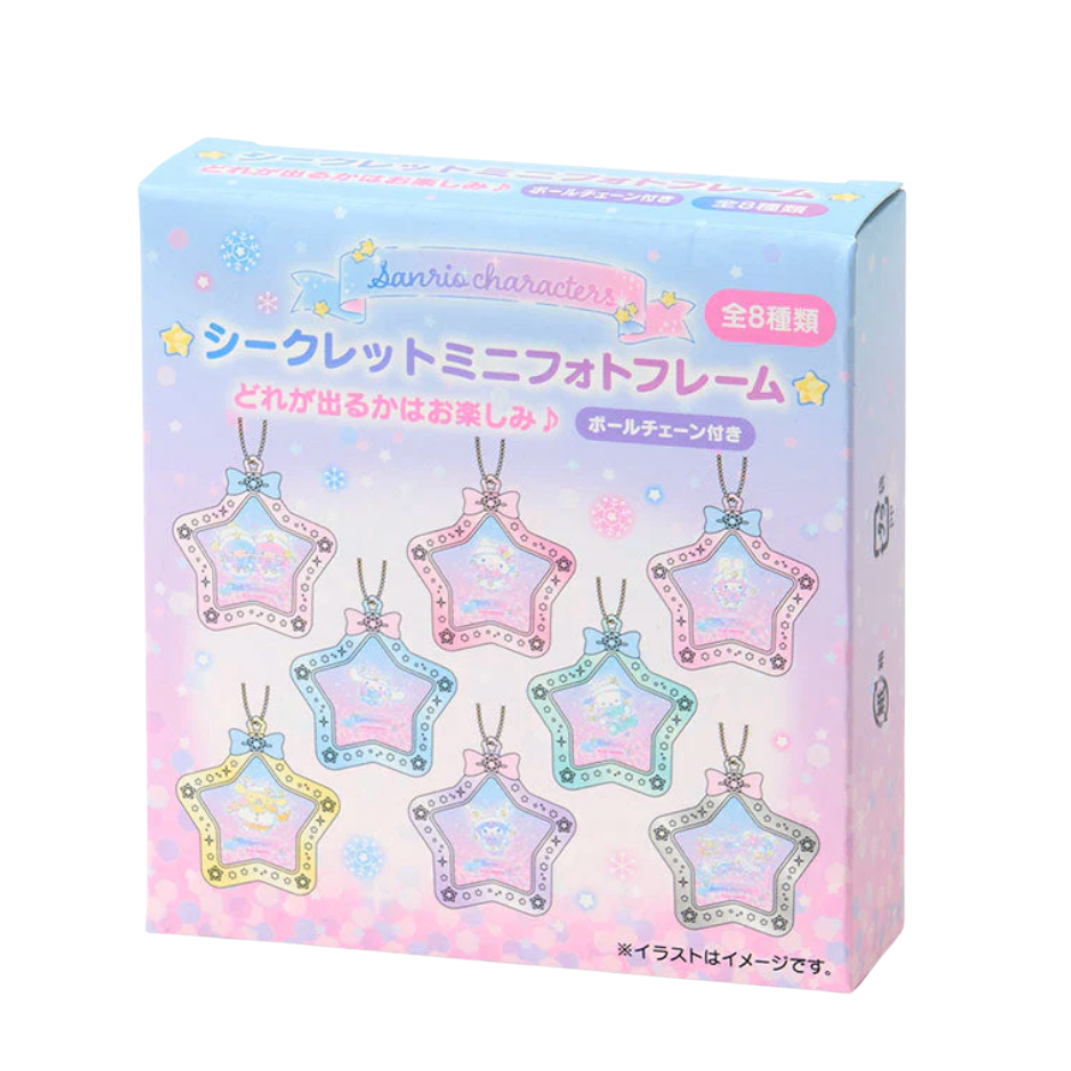Box of star-shaped decorative items with colorful packaging on a white background