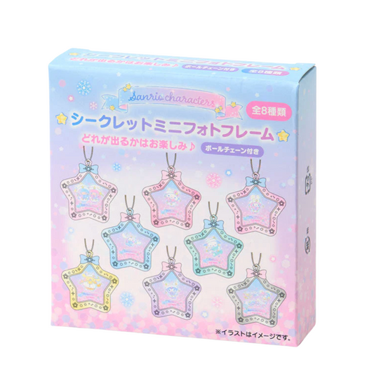Box of star-shaped decorative items with colorful packaging on a white background