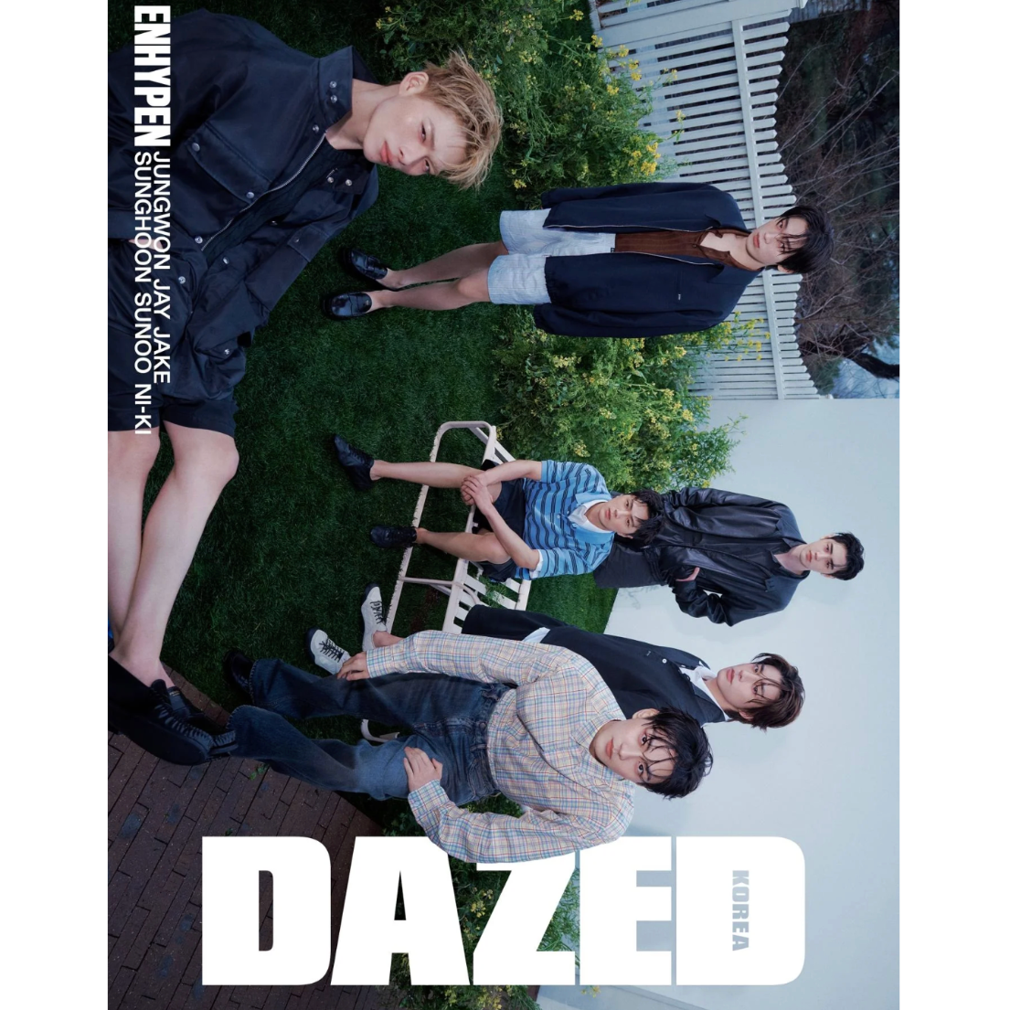 Group of people in a park setting with 'DAZED' branding