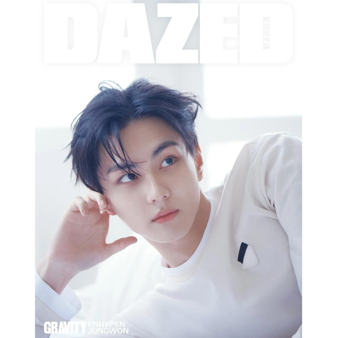Person wearing a white shirt with 'DAZED' magazine cover text