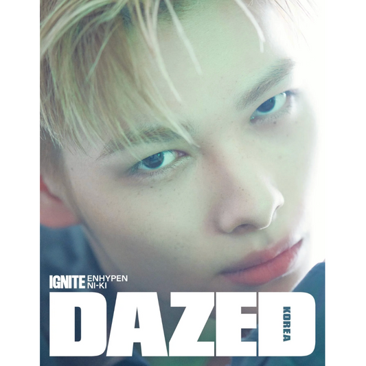 Close-up of a person with text 'IGNITE ENHYPEN NIKI DAZED KOREA' on a white background