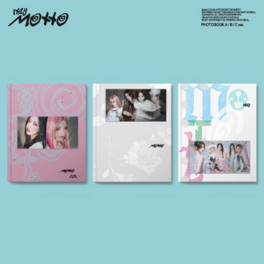 Three photobooks with images of a girl group on a light blue background