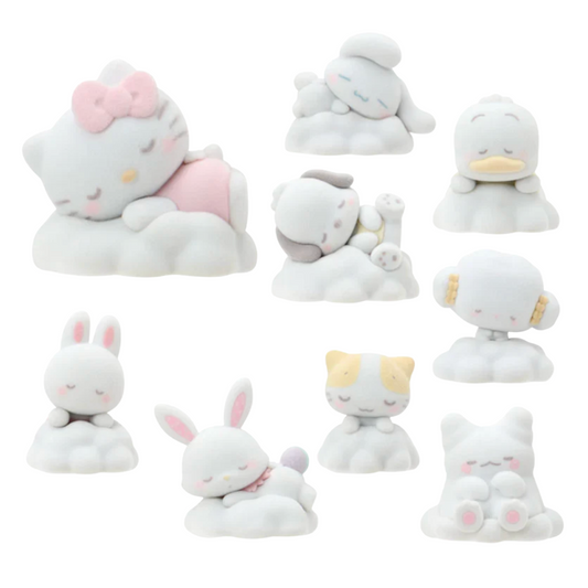Set of small plush Sanrio character toys on a white background