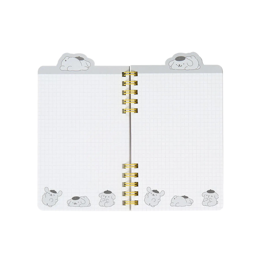 Open planner with decorative pages on a white background