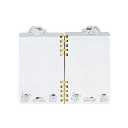 Open planner with decorative pages on a white background