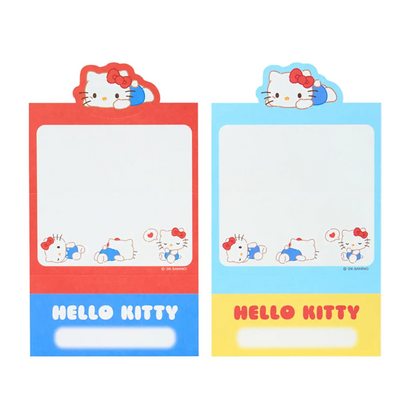 Two 'Hello Kitty' themed notepads, one red and blue, the other yellow and blue, on a white background.
