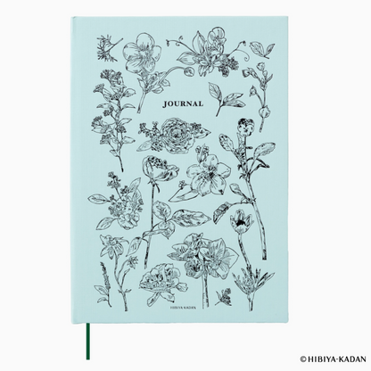 Journal with floral illustrations on a light blue background