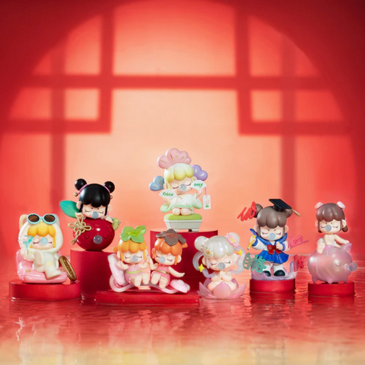 Set of colorful figurines on a red platform with a red background