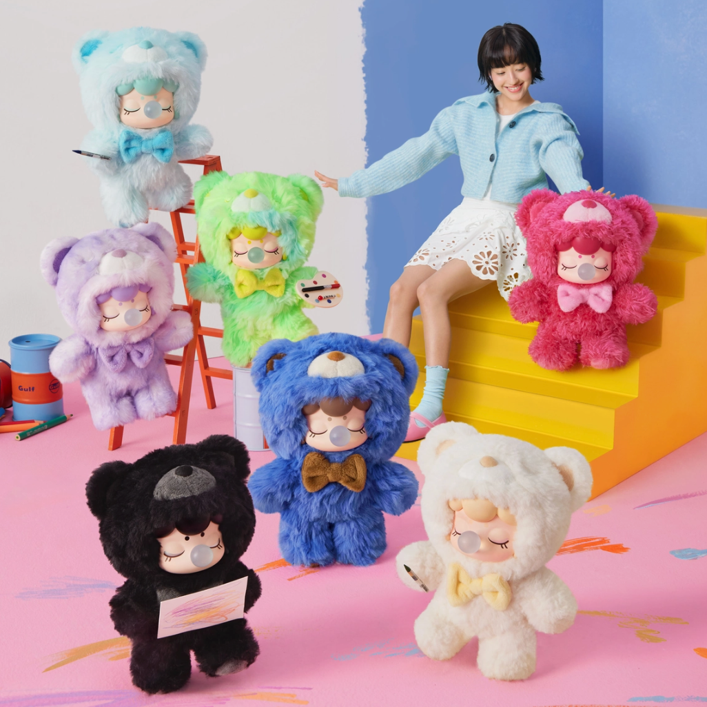 Woman interacting with colorful plush toys in a playful setting
