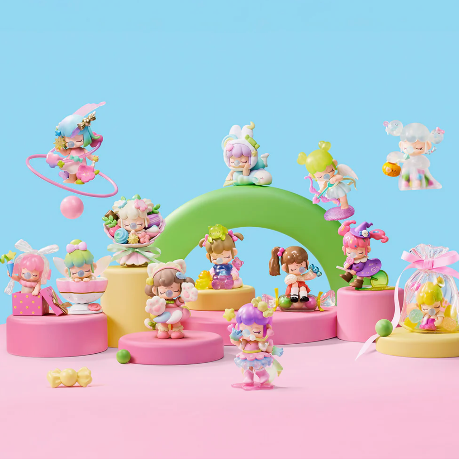 Colorful toy figures on a pink and blue background