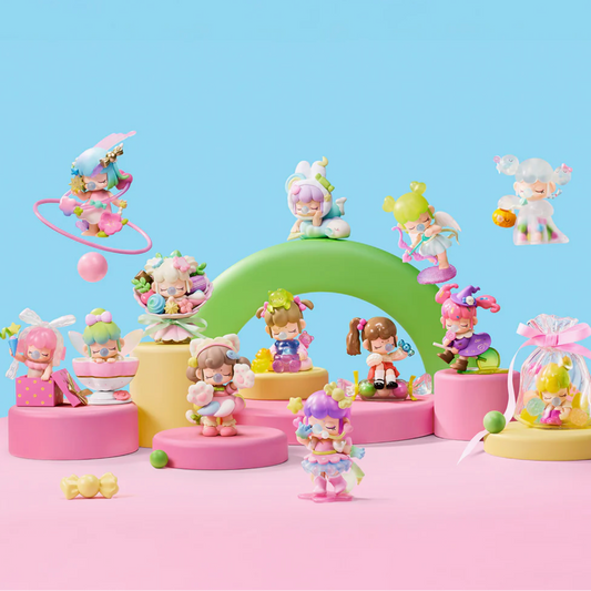 Colorful toy figures on a pink and blue background