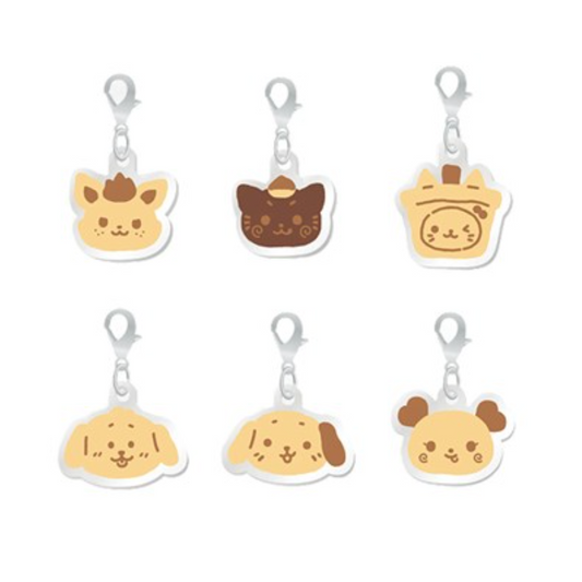Set of six animal-themed keychains on a white background