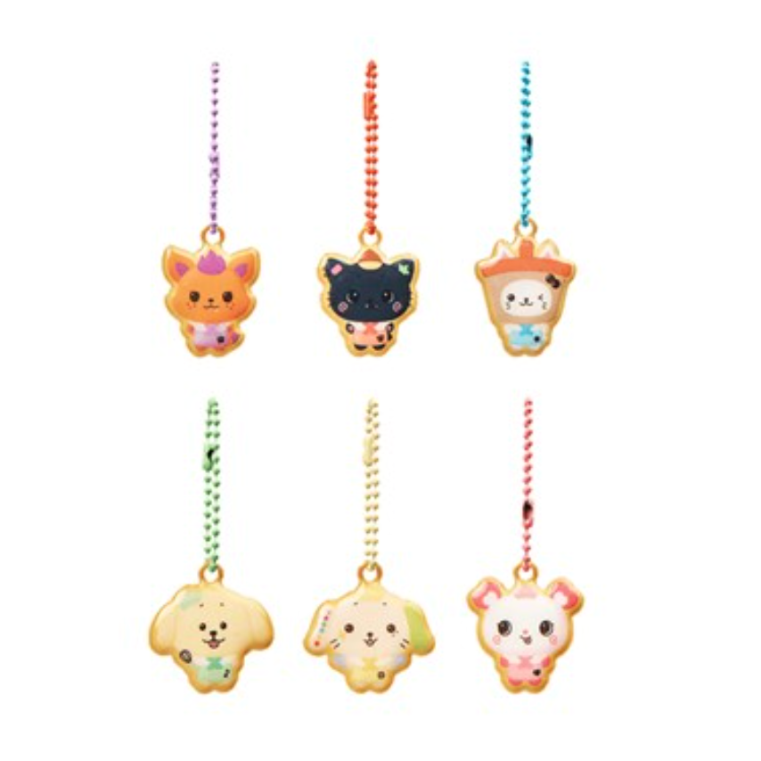 Set of colorful animal-themed keychains on a white background