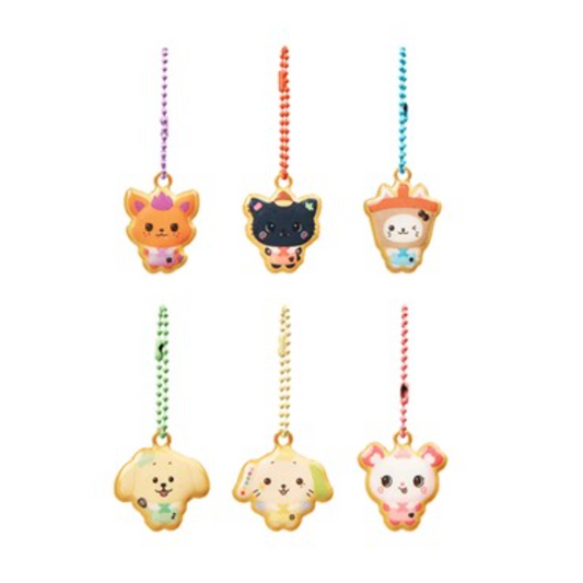 Set of colorful animal-themed keychains on a white background