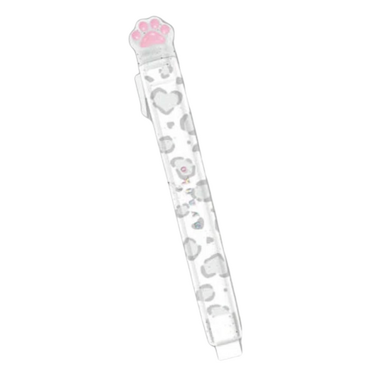A clear plastic retractable pen with a pink paw print cap and a pattern of gray hearts and small gray animal silhouettes inside.