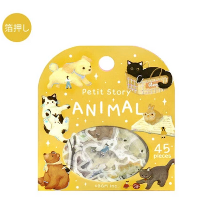 A packaged set of small animal-themed items on a yellow backing card labeled 'Petit Story ANIMAL' with '45 pieces' and a circular window showing the contents. The card is illustrated with cartoon animals including a dog, cat, rabbit, bear, and penguin, and includes a small yellow circle with Japanese text in the upper left.