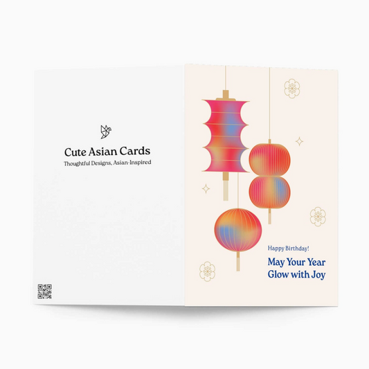 A folded greeting card shown open against a light gray background. The left panel is white with the text 'Cute Asian Cards' and a small logo.