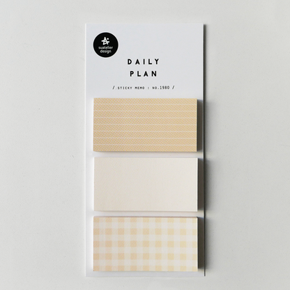 A package of three washi tape rolls labeled 'DAILY PLAN' by the brand 'paper paradise', featuring beige, white, and cream gingham patterns on a light gray background.