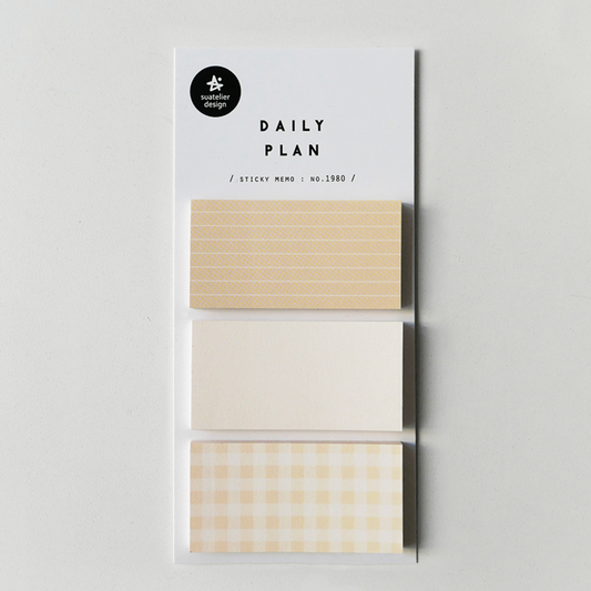 A package of three washi tape rolls labeled 'DAILY PLAN' by the brand 'paper paradise', featuring beige, white, and cream gingham patterns on a light gray background.