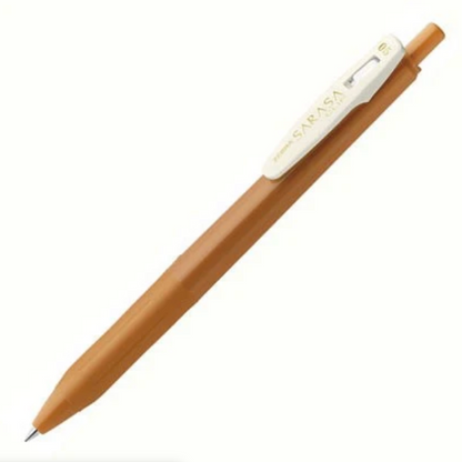 A tan Sarasa Pigma pen with a white clip, shown diagonally on a plain white background.