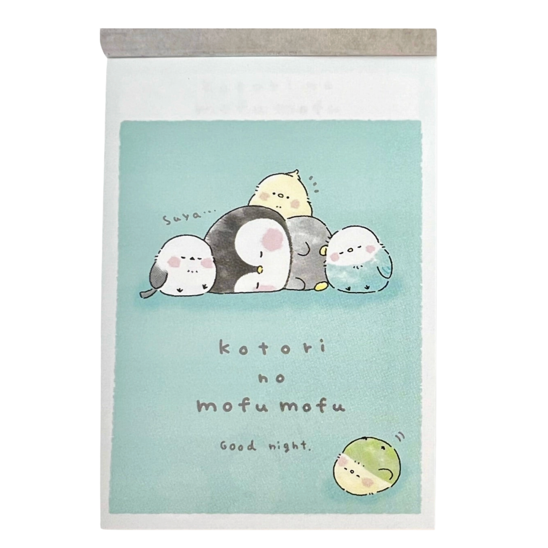 Memo pad featuring a light blue-green cover illustration of five Sumo-like animals resting together, with the text 'kotori no mofu mofu' and 'Good night.'.
