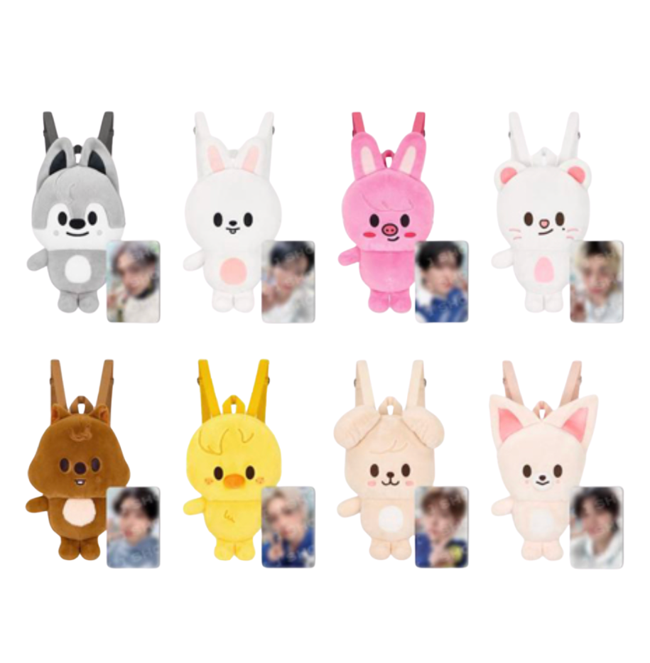 Eight plush character backpacks arranged in two rows on a white background, each shown with a small printed photo insert. The characters include gray, white, pink, cream, brown, yellow, and light beige tones.