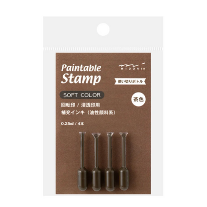 A package of four paintable stamp applicators labeled 'Paintable Stamp SOFT COLOR' on a brown card inside a clear hanging pouch, photographed against a white background.