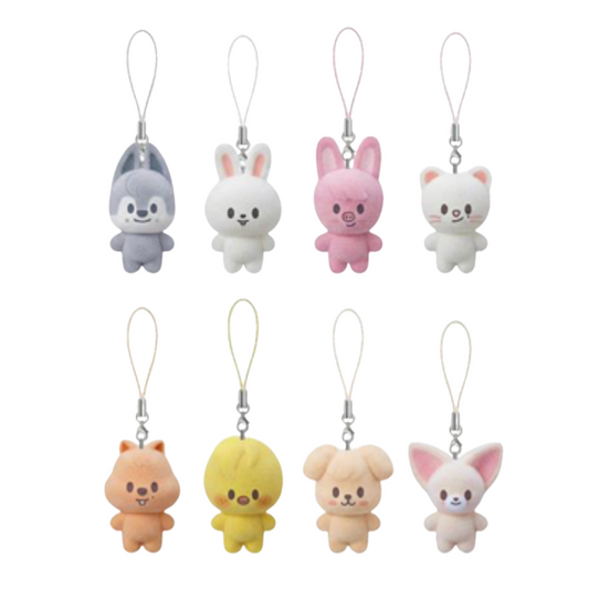 Eight small plush character keychains or bag charms arranged in two rows on a plain white background. The characters include gray, white, pink, white, peach, yellow, beige, and pale pink, each with a loop strap at the top.