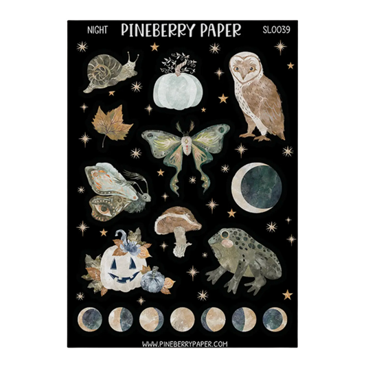 A sheet of Pineberry Paper stickers featuring autumn and celestial designs on a black background. The designs include a snail, pumpkin, owl, butterfly, moon, mushroom, frog, jack-o'-lantern, stars, and moon phases.