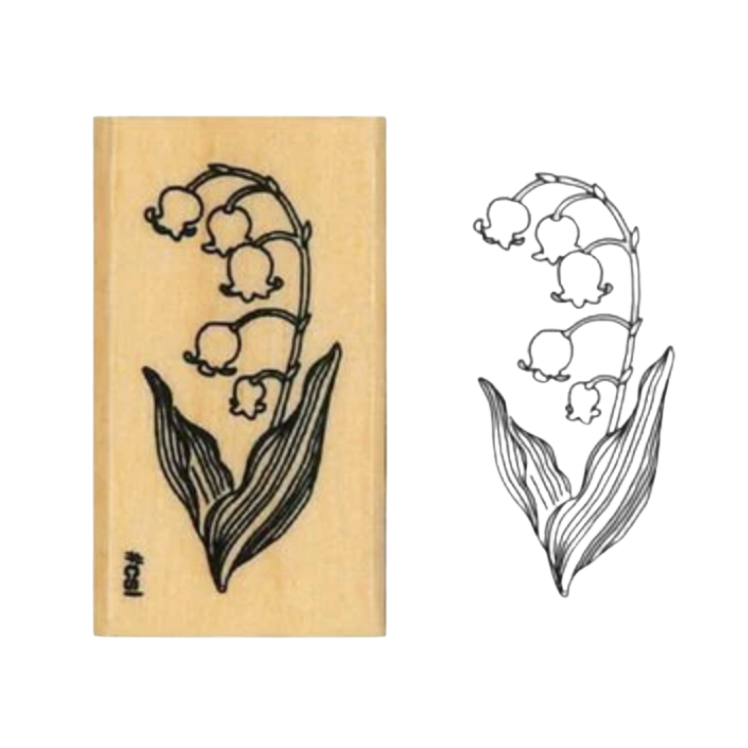 A wooden rubber stamp with a lily of the valley floral design, shown next to its corresponding inked stamp impression on a plain white background.