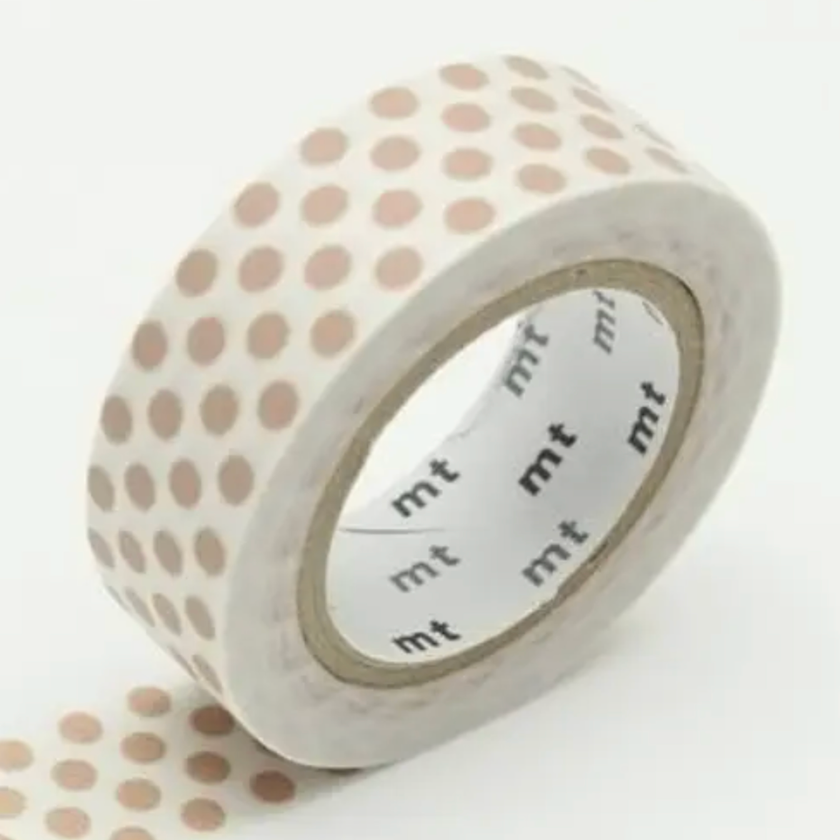 A roll of washi tape with a pattern of light beige polka dots on a white background, shown on a clean white surface with a small unrolled section visible in the lower left.