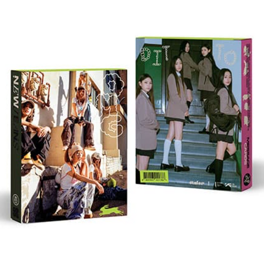 A boxed music release shown from the front and side on a plain white background. The front cover features a group of young women in school uniforms standing on steps, with the title text 'DITTO' and 'OMG' visible.