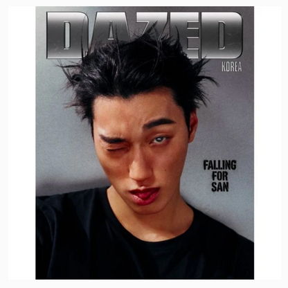 A magazine cover featuring a close-up portrait of a man with messy dark hair, wearing a black shirt against a gray background. The masthead reads 'DAZED' with 'KOREA' below it, and the cover text includes 'FALLING FOR SAN'.