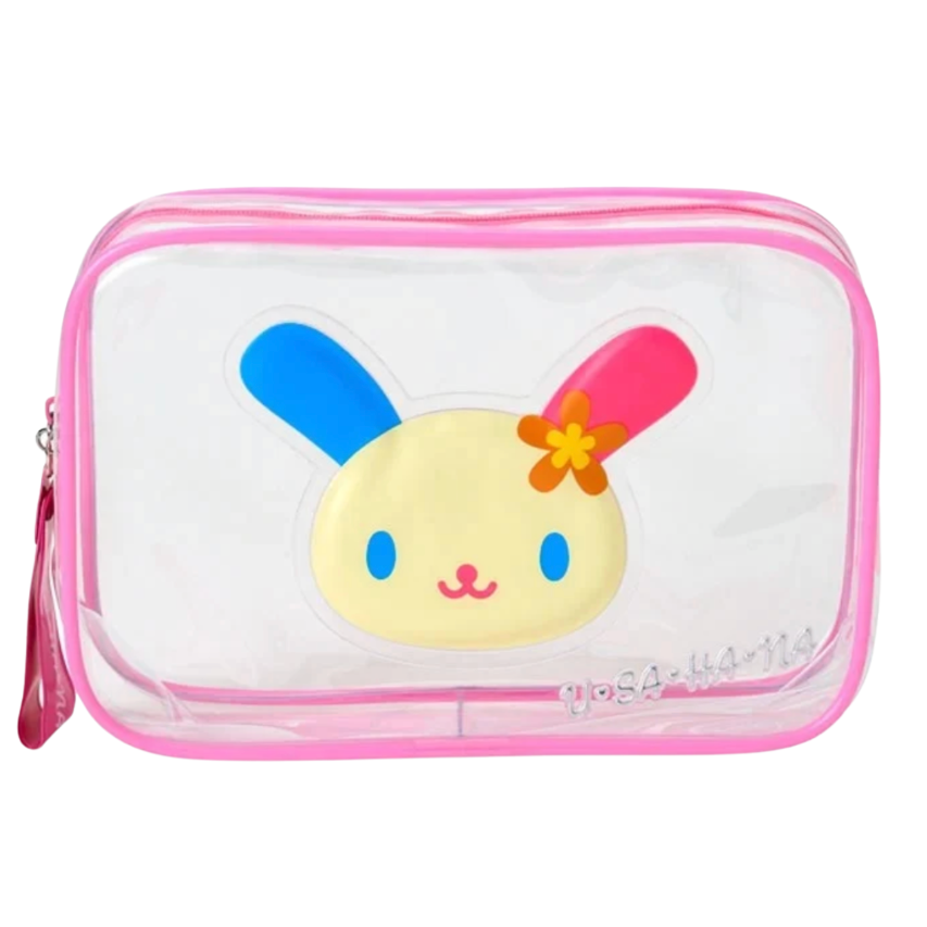 A clear plastic zippered pouch with a pink border and a cartoon bunny face design on the front. The bunny has blue and pink ears, a yellow face, and a small orange flower on its head.
