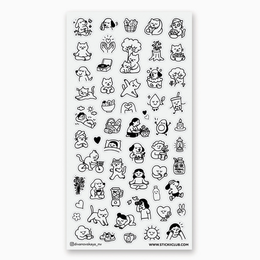 A sheet of clear nail stickers featuring black and white cute cartoon dog illustrations, displayed on a clean white background.
