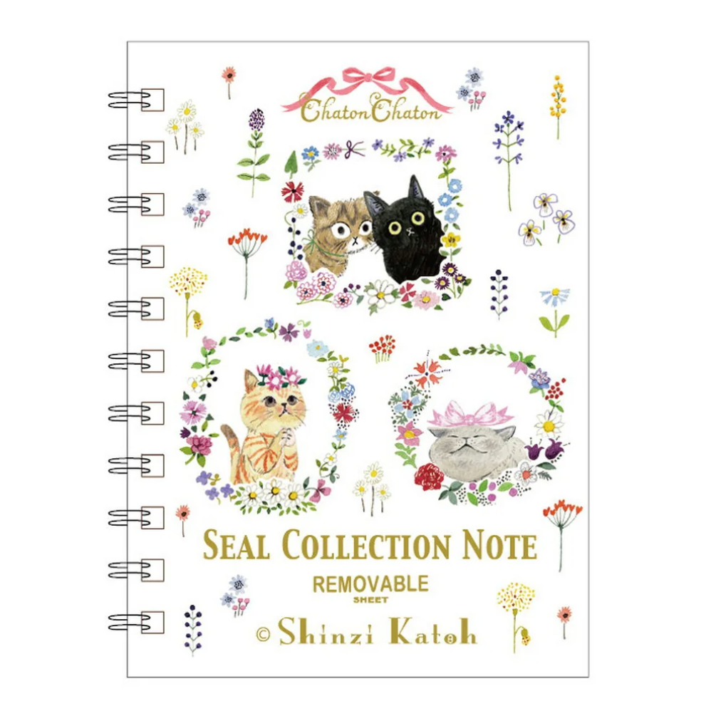 A spiral-bound notebook cover featuring cute cat illustrations, floral wreaths, and the text 'Chatons Chatons' and 'SEAL COLLECTION NOTE REMOVABLE paper' with '© Shinzi Katoh' at the bottom.