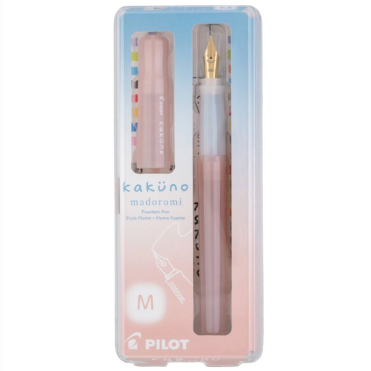 Pilot Kakùno Madoromi Fountain Pen and refill set in a clear plastic case with a pastel blue and pink gradient background.