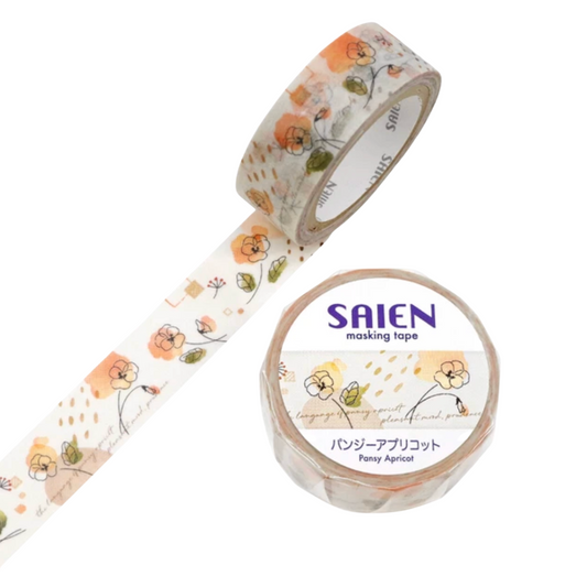 A roll of SAIEN masking tape with a floral pattern, shown partially unrolled next to its circular plastic spool. The tape features orange and yellow flowers with green leaves on a warm cream background.