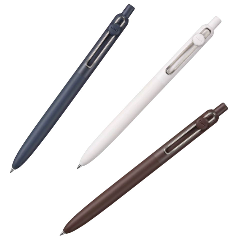 Three retractable pens shown on a plain white background: one dark blue-gray, one off-white, and one brown.