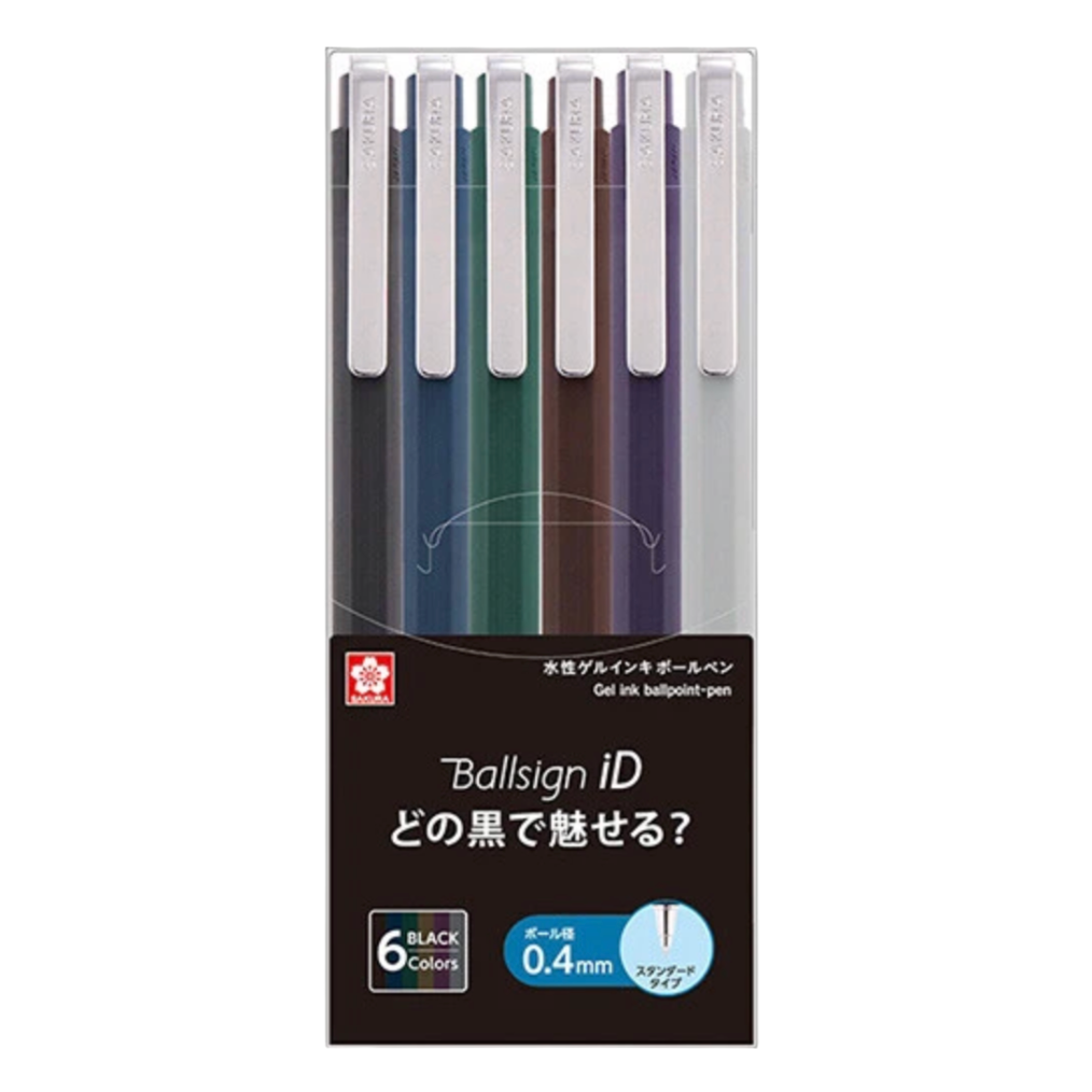 A 6-pack of Sakura Pigma Ballsign iD gel ink ballpoint pens in various colors, packaged in a clear plastic case with a black and white background.