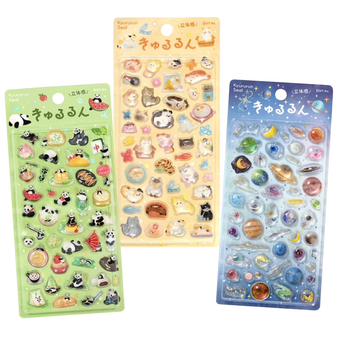 Three packaged sticker sheets with cute animal and food illustrations, shown on a plain white background. The left sheet is light green, the center is pale yellow, and the right is blue, each with Japanese text at the top.
