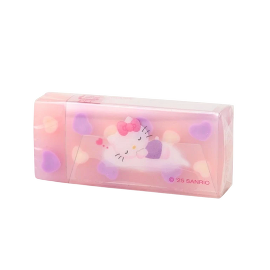 A pink Hello Kitty plastic eraser with a showing the character illustration inside, on a plain white background.