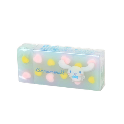 A Cinnamorell-themed translucent eraser, featuring Sanrio Cinnamoroll character with pink and yellow heart accents on a white background.