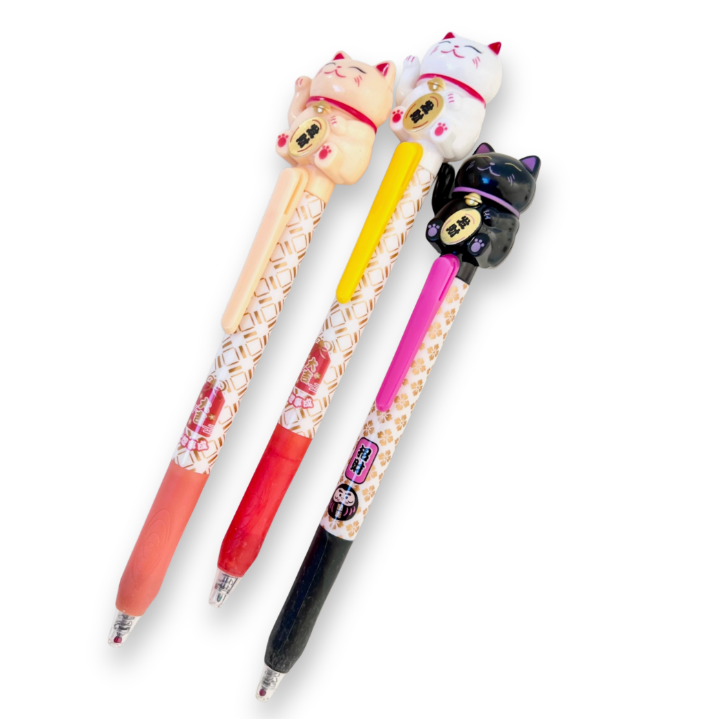 Three cat-shaped pens with different color bodies on a white background