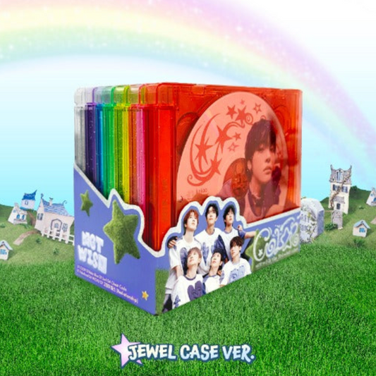 Jewel case with colorful covers and a group photo on a grassy field with rainbow sky