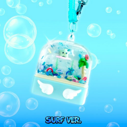 Small aquarium keychain with fish and plants with text ' SURF VER.' on a blue background with bubbles